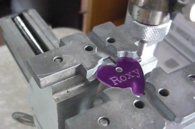 Engraving Service Engraving a pet tag e1517860428939
